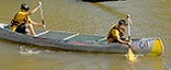 DAILY NEWS PHOTOS/Chris Kinkaid Venturer Crew 313 members Cade Ard (left) and Josh Gulczynski paddle toward the bridge near Sun. The two were part of the winning team for the boys’ beginners divison at the Bogue Chitto Race.
