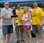 Alumni racers David Jenkins and Shannon Jenkins, who are flanked by Robert Terrell (left) and Jimbo Stillwell, are pictured after capturing the coveted Spot Bankston Trophy in the Bogue Chitto Race.