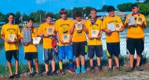 Pictured are members of the four Bogalusa Venturer Crew 313 Boys Beginners Aluminum Teams. They are, from left, first place Cade Ard and Josh Gulczynski, second place Matthew Dennis and Josh Ard, third place Chase Kelehan and David Jenkins and fourth place Robert Hall and Barrett Williams. Everyone is holding up their individual plaques. Ard and Gulczynski are shown with their National Henry Wilkens Rookie Award for being the fastest overall beginners.