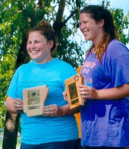 Pictured is the runner up team of Bush Venturer Crew 213. Maggie From (left) and Kimberlie Davis are shown with their individual plaques. The two finished runner up in the Girls Beginners Alunimum Racing Division at the 49th annual National Invitational White River Canoe Race. The event took place from July 23-25 in Arkansas.