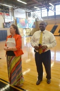 DAILY NEWS PHOTO/Randy Hammons Bogalusa City Schools sixth-eighth- grade principals Sheila Lawrence, left, and Eric Greely speak to students Thursday in the gym on the first day of school.  