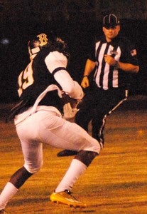 DAILY NEWS PHOTO/Chris Kinkaid Bogalusa’s Dominique Tillman intercepts a pass and starts to return it against Salmen on Friday night.