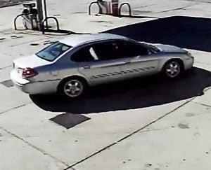 The female suspect allegedly left in this silver Ford Taurus.