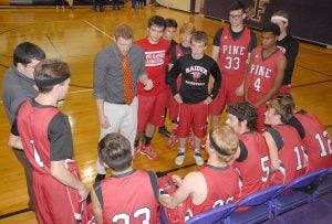 DAILY NEWS PHOTO/Chris Kinkaid Pine coach Drew Meyerchick speaks to his team in a timeout earlier this season. The District 10-2A Tournament is next Tuesday and Friday.