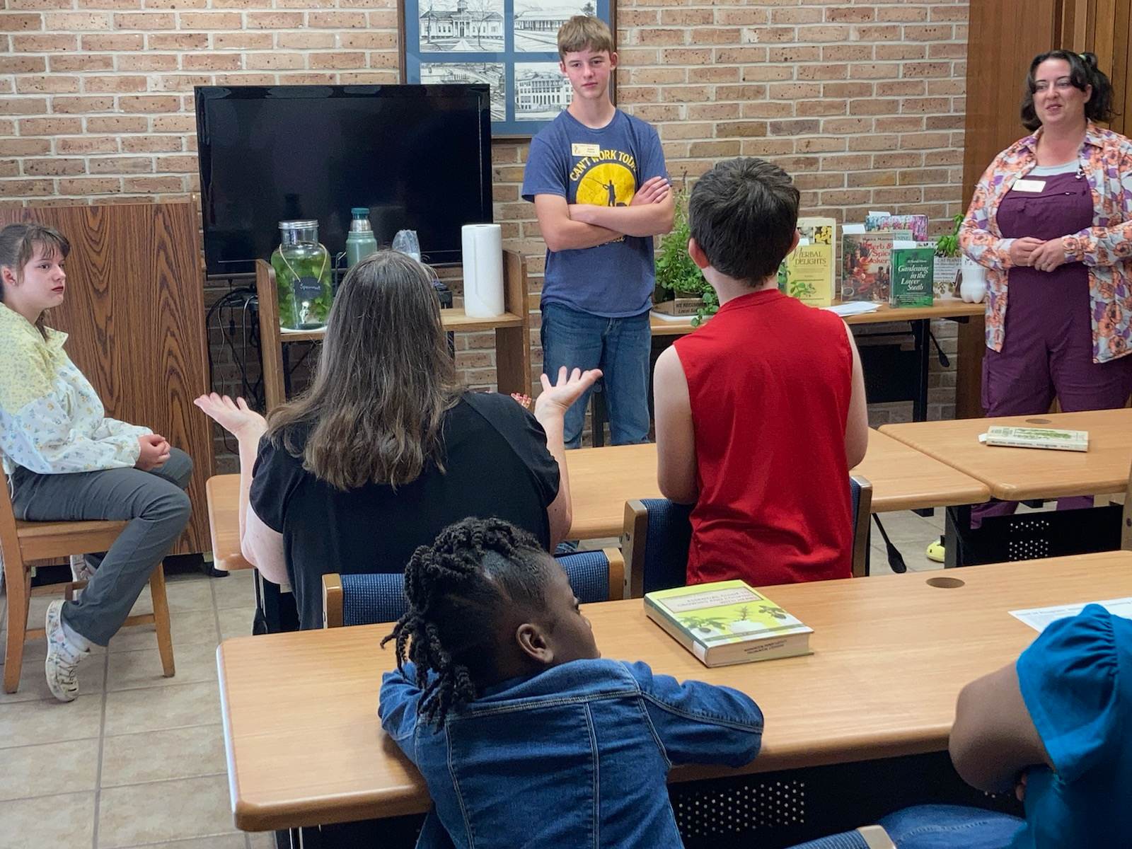 Guest volunteers from the LSU Ag Center share love of herbs, how they
