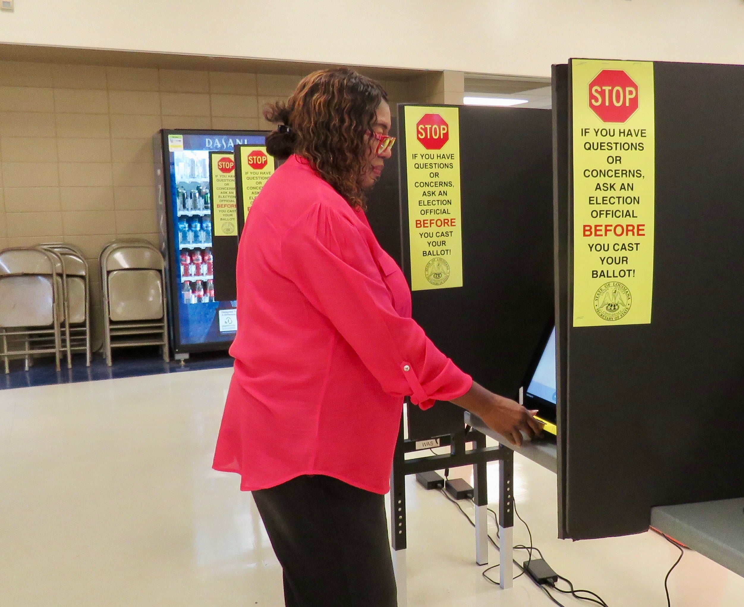 Central Fox demonstrating how to use the voting machine at Northshore Technical College.