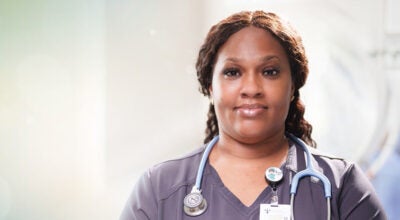 Terra Taylor, a dedicated respiratory therapist, pictured in her scrubs with a stethoscope around her neck at Our Lady of the Angels Hospital in Bogalusa.